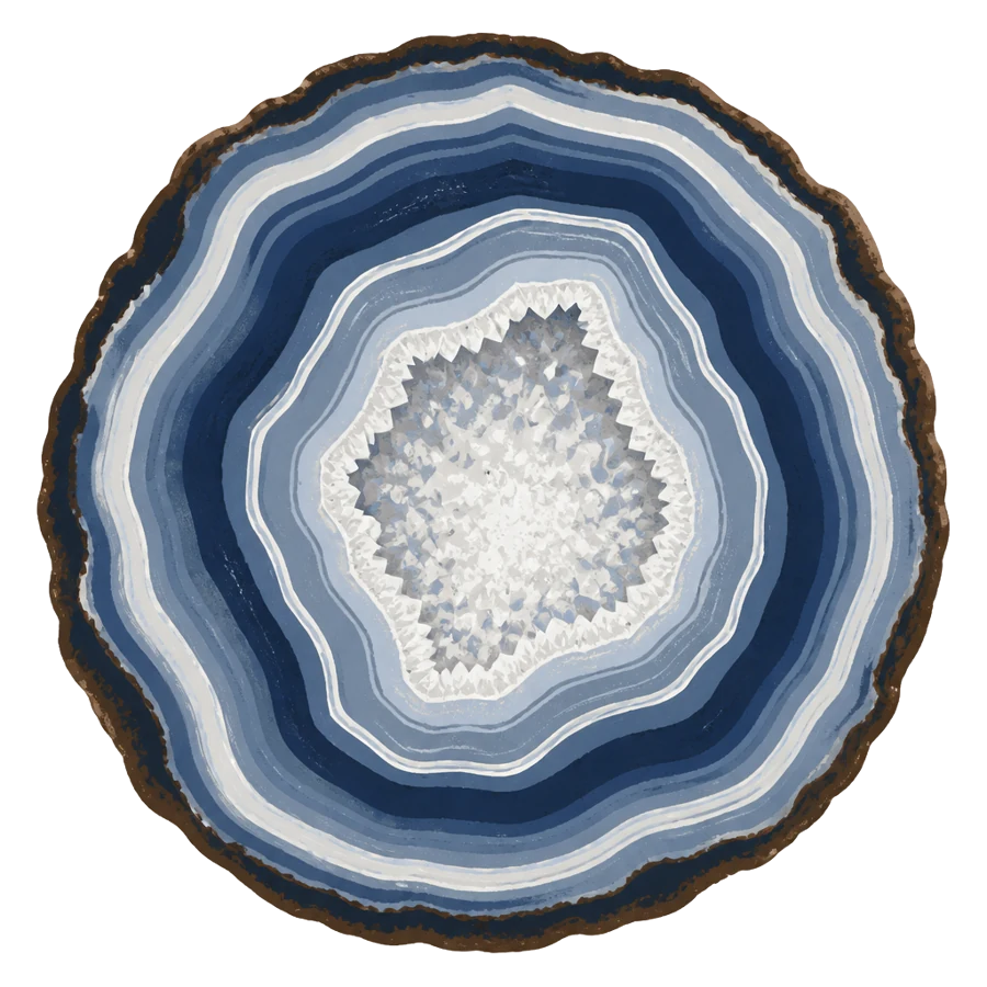 Sliced agate with blue-gray and navy banding around a white quartz center